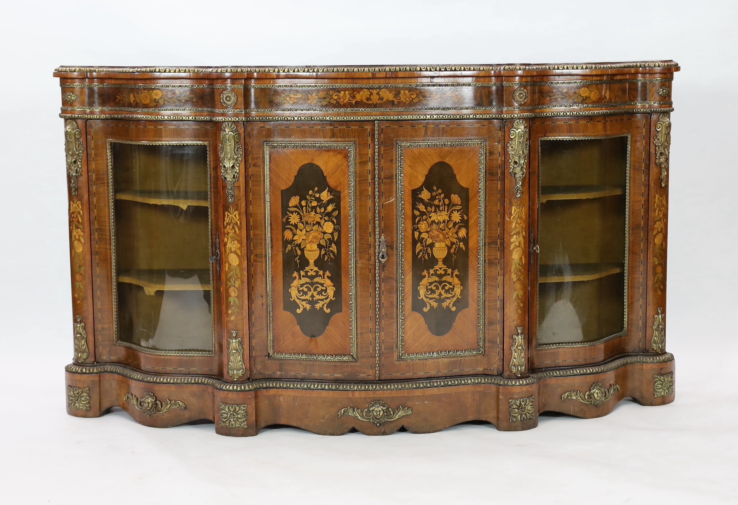 A Victorian marquetry inlaid walnut serpentine credenza, W.201cm D.48cm H.113.5cm